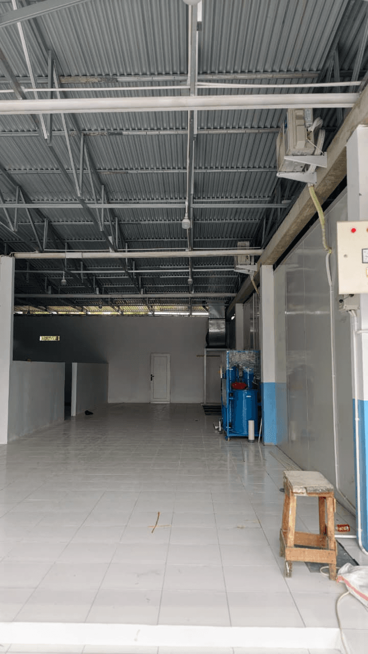Open work area of an industrial kitchen facility in Timika